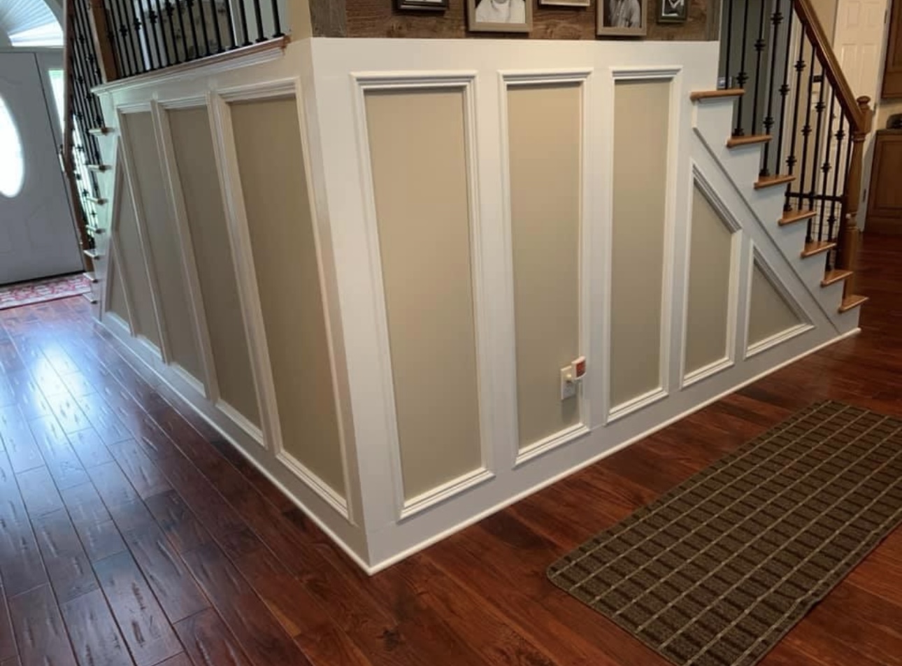 Stair landing with wainscoting