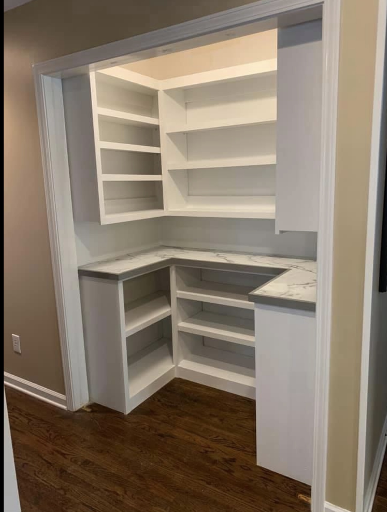 Butler's pantry with marble countertop