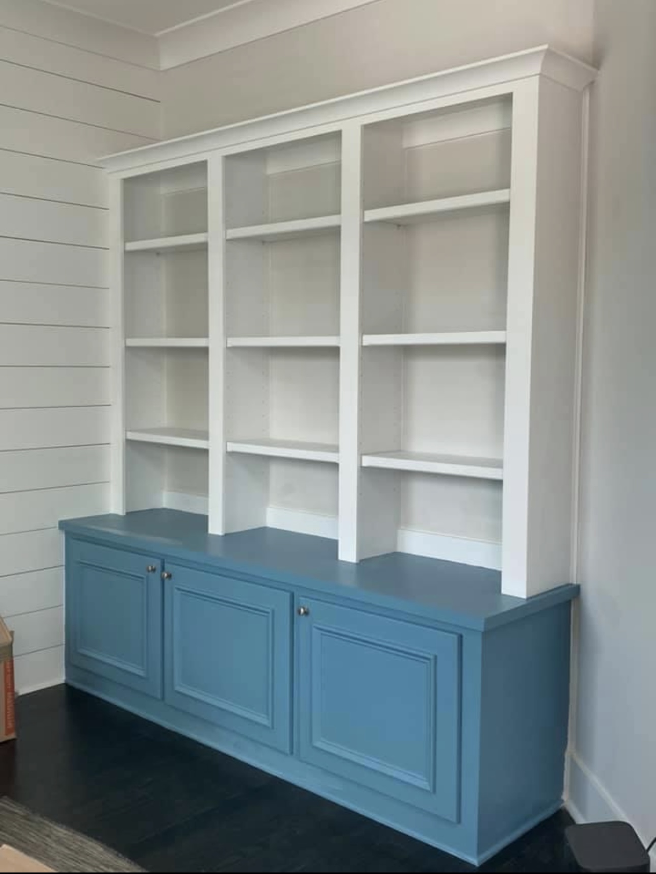 Blue base cabinet with white upper shelving
