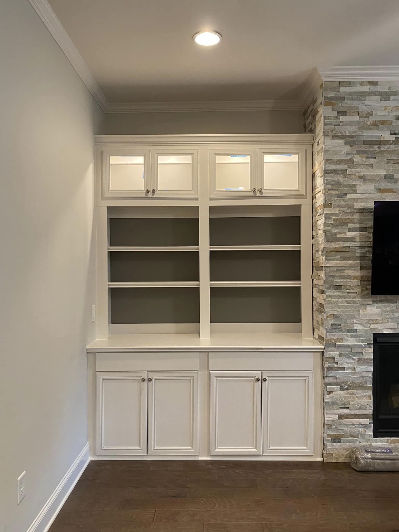 Fireplace built-in with glass doors and LED lighting