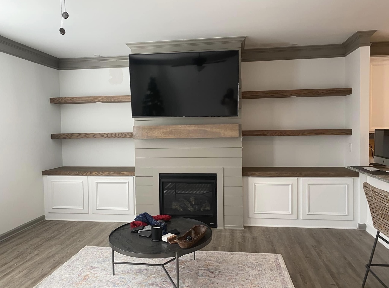 Fireplace surround with floating shelves