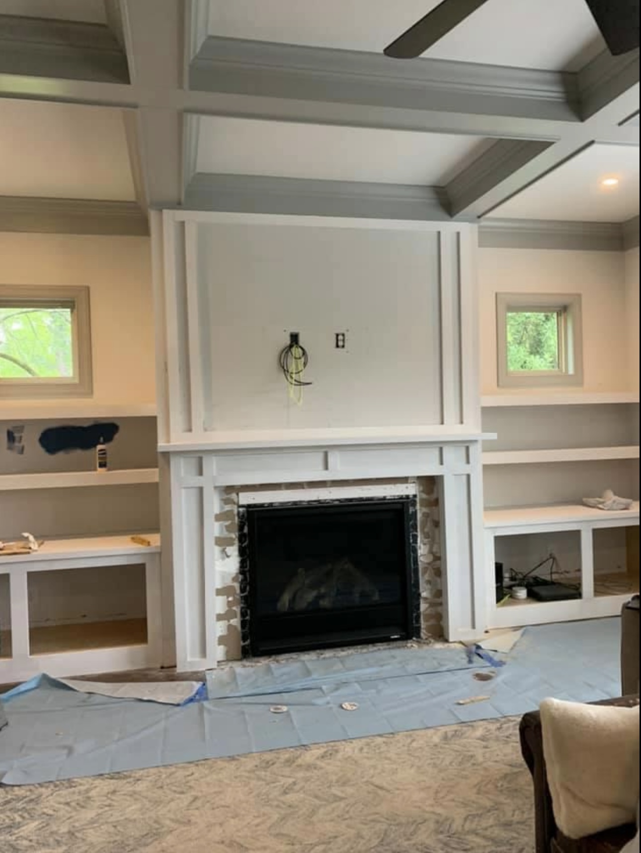 Entertainment center with coffered ceiling