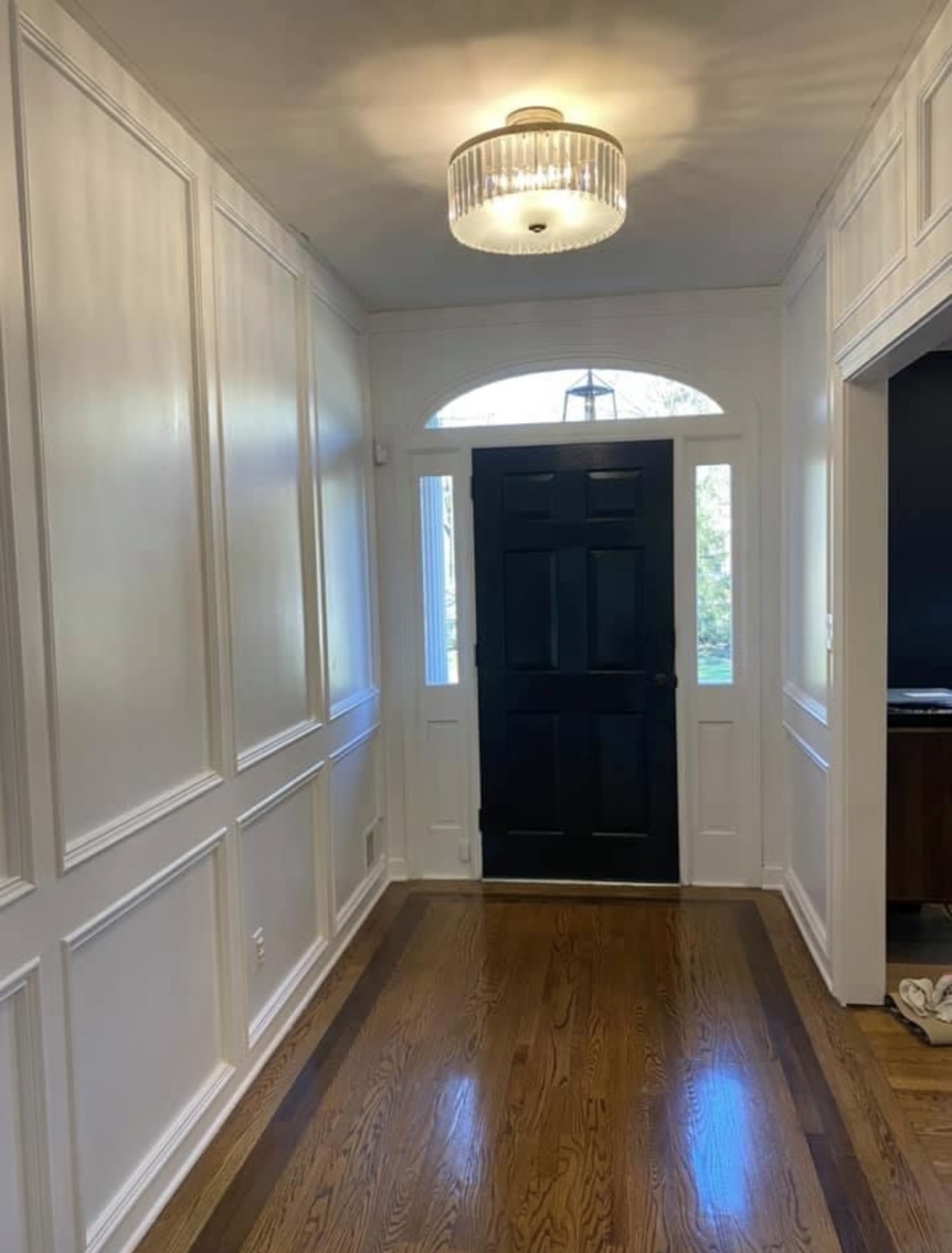 Entry foyer with wainscoting