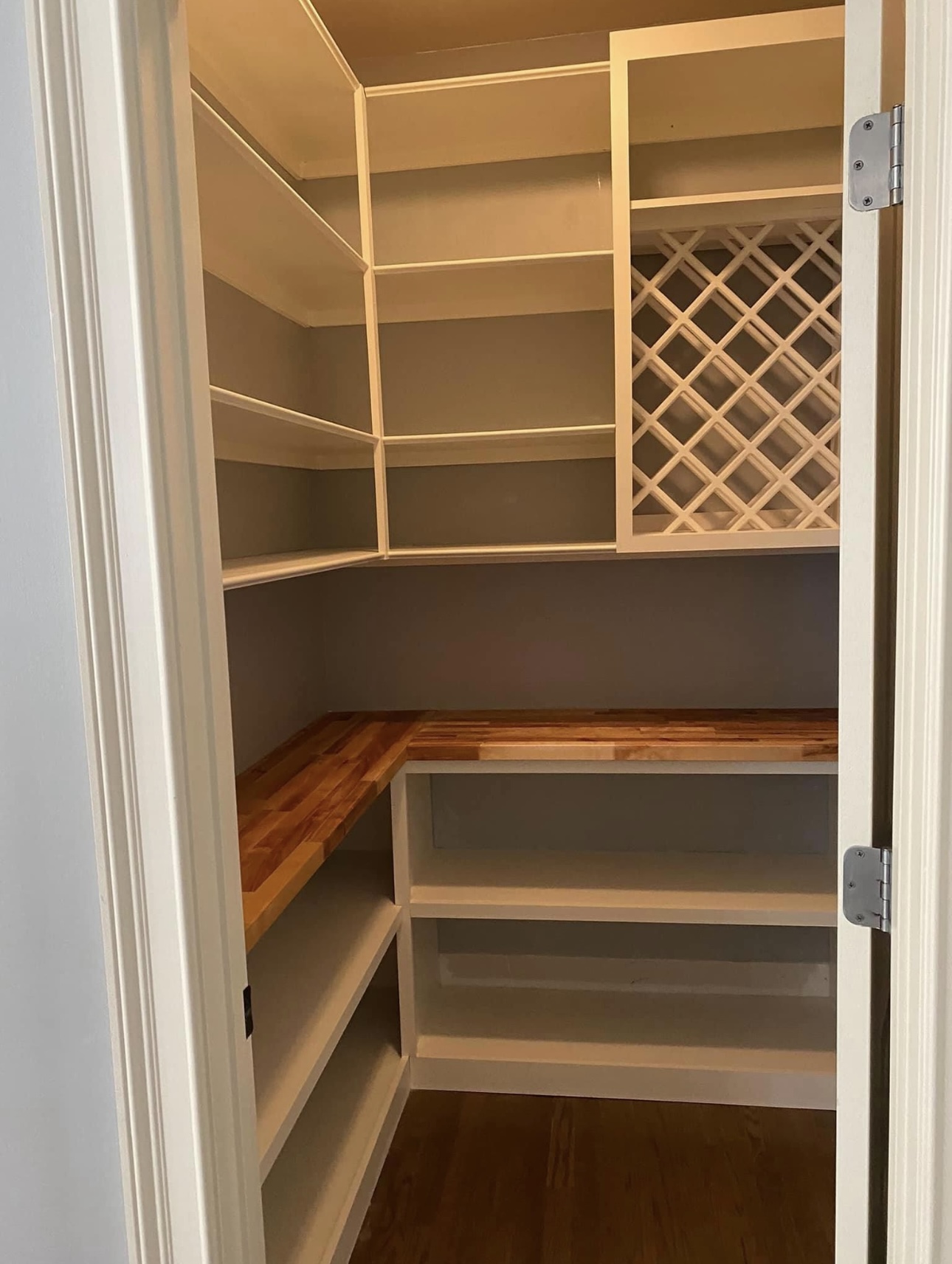 Small pantry with corner shelving