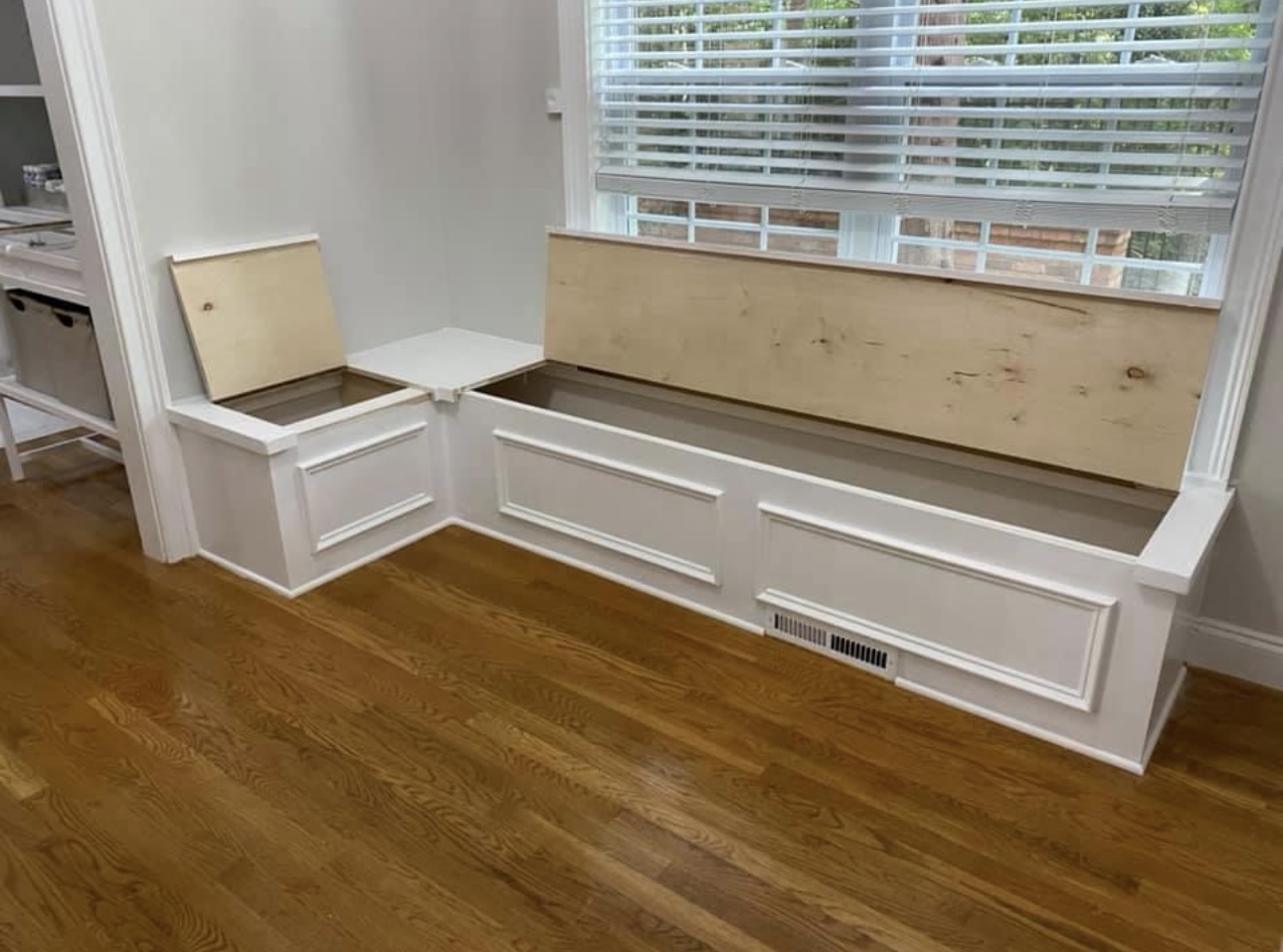 White window bench opened showing storage